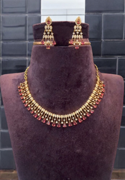 Simple neck set with diamond and ruby stone pairing with beautiful earrings